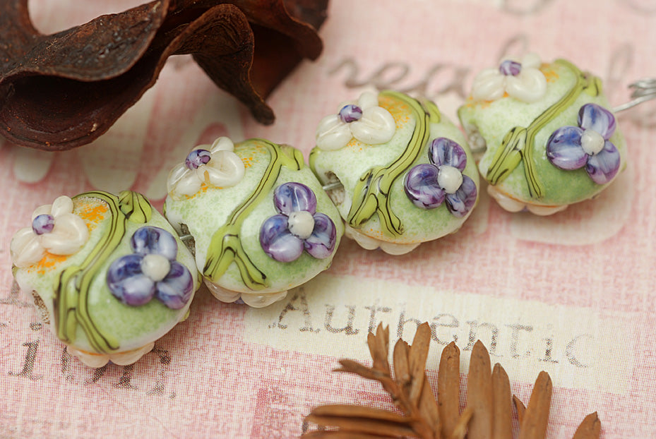 10504512 - Four White w/Purple Flora Lentil Beads