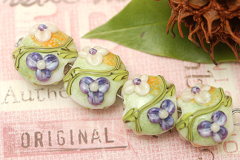 10504512 - Four White w/Purple Flora Lentil Beads