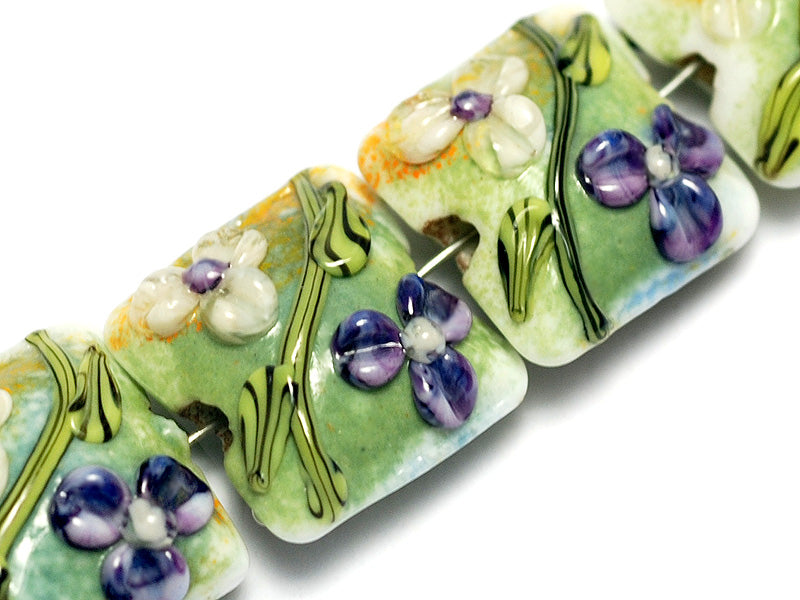10504514 - Four White & Purple Flora Pillow Beads