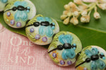 10504602 - Seven Blue Dragonfly Lentil Beads