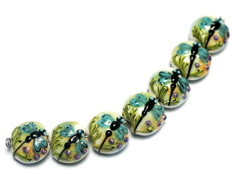 10504602 - Seven Blue Dragonfly Lentil Beads