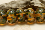 10504701 - Seven Green & Orange Rondelle Beads