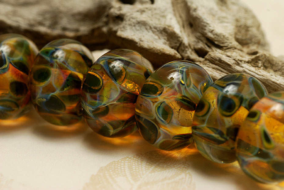 10504701 - Seven Green & Orange Rondelle Beads