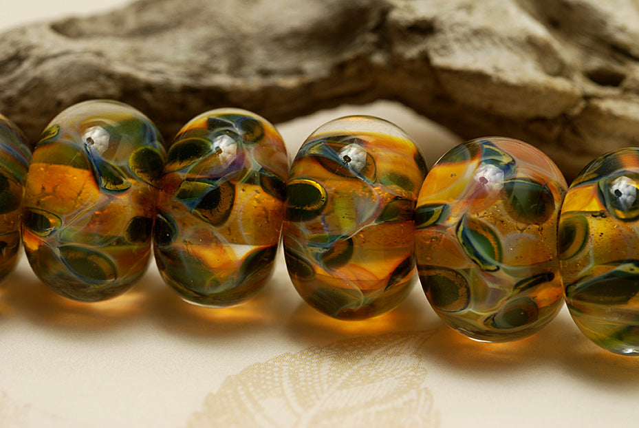 10504701 - Seven Green & Orange Rondelle Beads