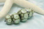 10504911 - Five Moss Green w/Metal Dots Graduated Rondelle Beads