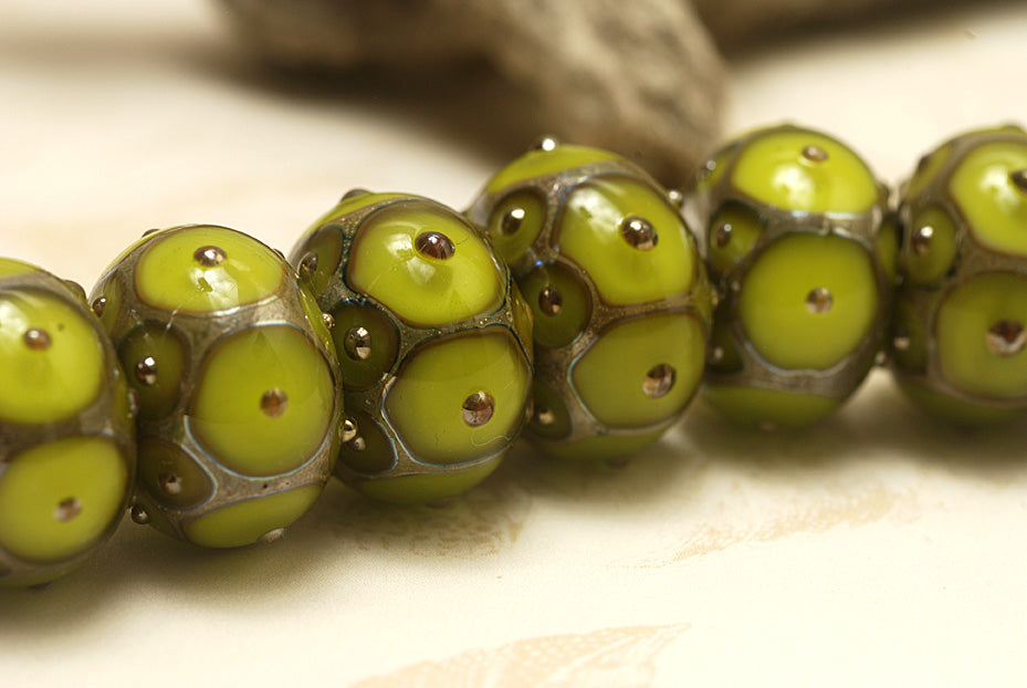 10505001 - Seven Pear Green w/Metal Dots Rondelle Beads