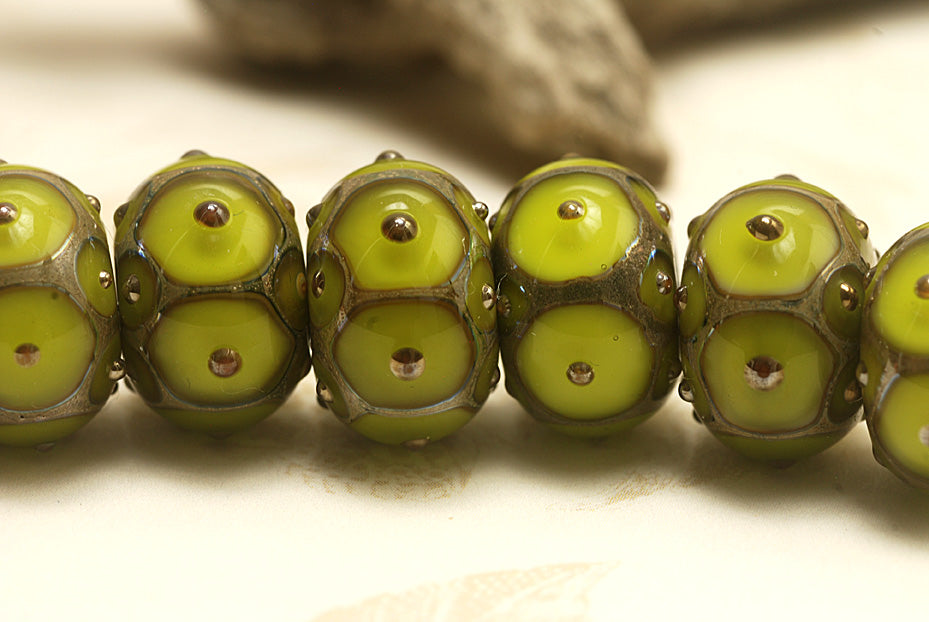 10505001 - Seven Pear Green w/Metal Dots Rondelle Beads