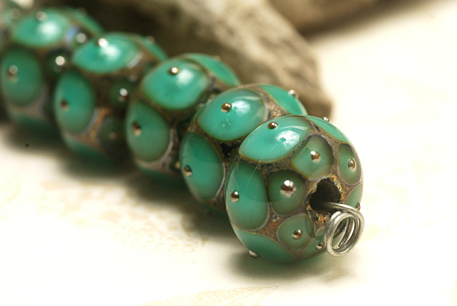 10505101 - Seven Ocean Green w/Metal Dots Rondelle Beads