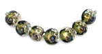 10505202 - Seven Emerald Treasure Lentil Beads