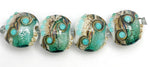 10505812 - Four Mint Stardust Lentil Beads