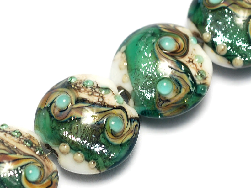 10505812 - Four Mint Stardust Lentil Beads