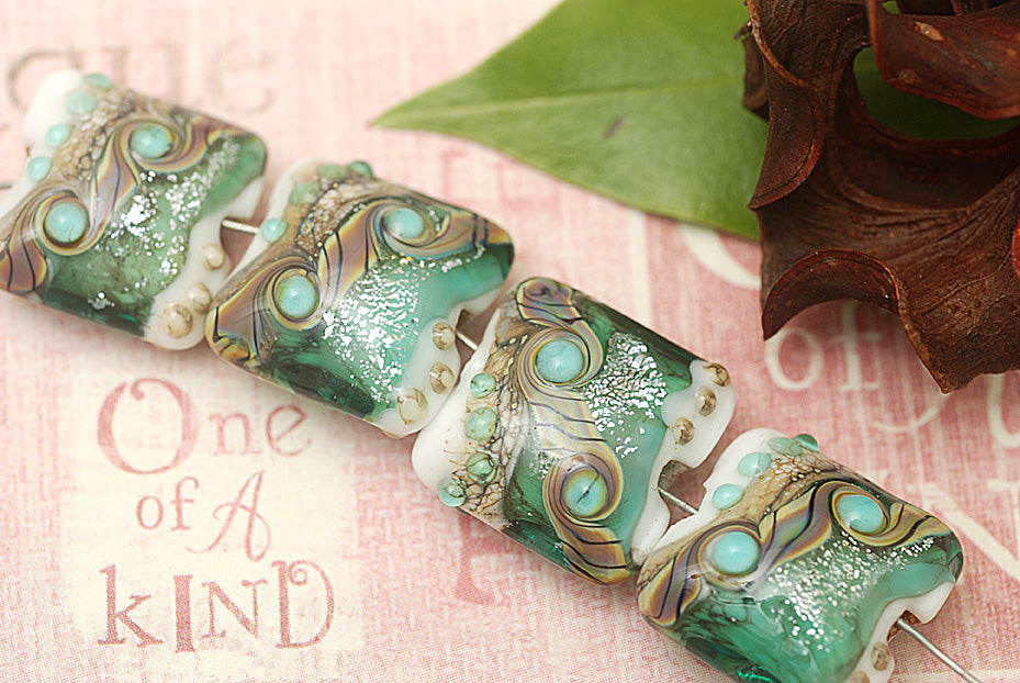 10505814 - Four Mint Stardust Pillow Beads