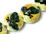 10507112 - Four Green Sparkle Garden Butterfly Lentil Beads