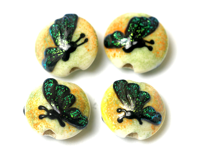 10507112 - Four Green Sparkle Garden Butterfly Lentil Beads