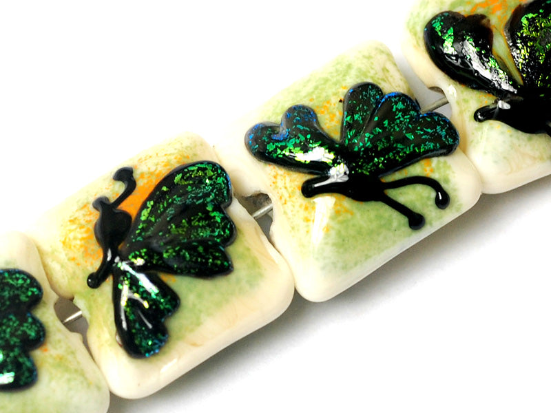10507114 - Four Green Sparkle Garden Butterfly Pillow Beads