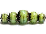 10507711 - Five Spring Green Shimmer Graduated Rondelle Beads