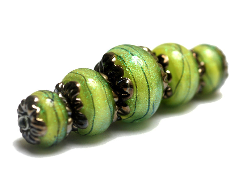 10507711 - Five Spring Green Shimmer Graduated Rondelle Beads