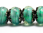10507821 - Six Seafoam Shimmer Rondelle Beads