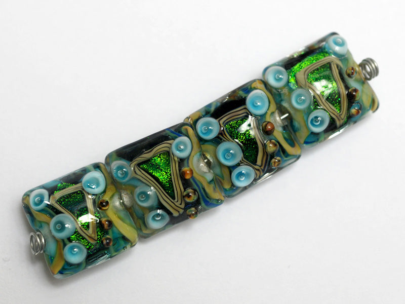 10508314 - Four Mirage Lake Pillow Beads