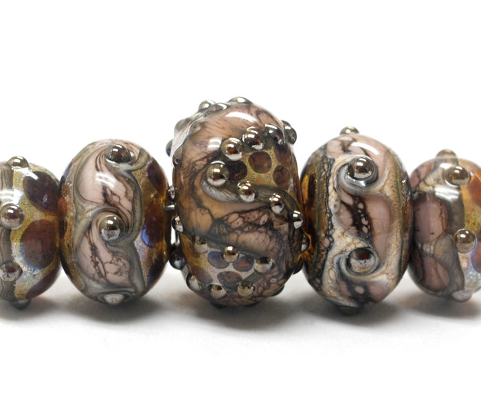 10601211- Five Graduated Dark Amethyst w/Silver Foil Beads