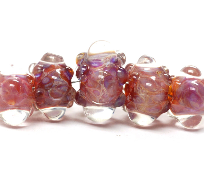 10601611 - Five Graduated Orange & Purple Rondelle Beads