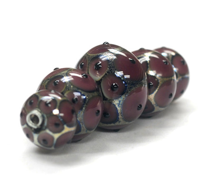 10601711 - Five Graduated Plum Rondelle Beads