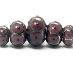 10601711 - Five Graduated Plum Rondelle Beads