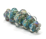 10601911 - Five Graduated Blue Boro Rondelle Beads