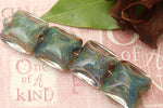 10602414 - Four Blue-green Free Style Pillow Beads