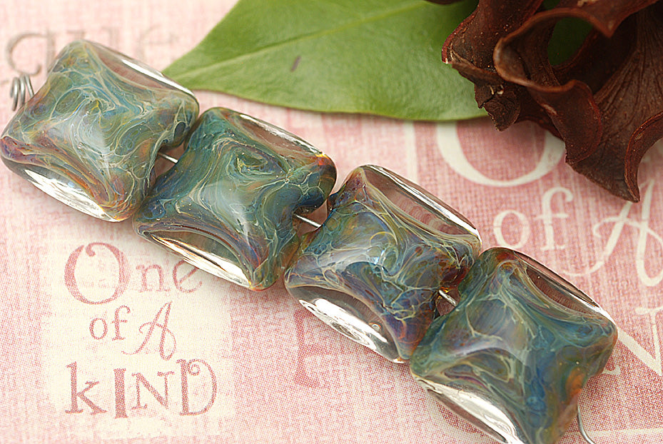 10602414 - Four Blue-green Free Style Pillow Beads