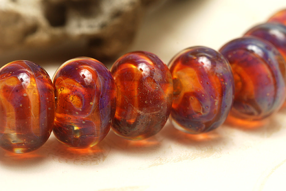 10602601 - Seven Orange & Purple Free Style Rondelle Beads