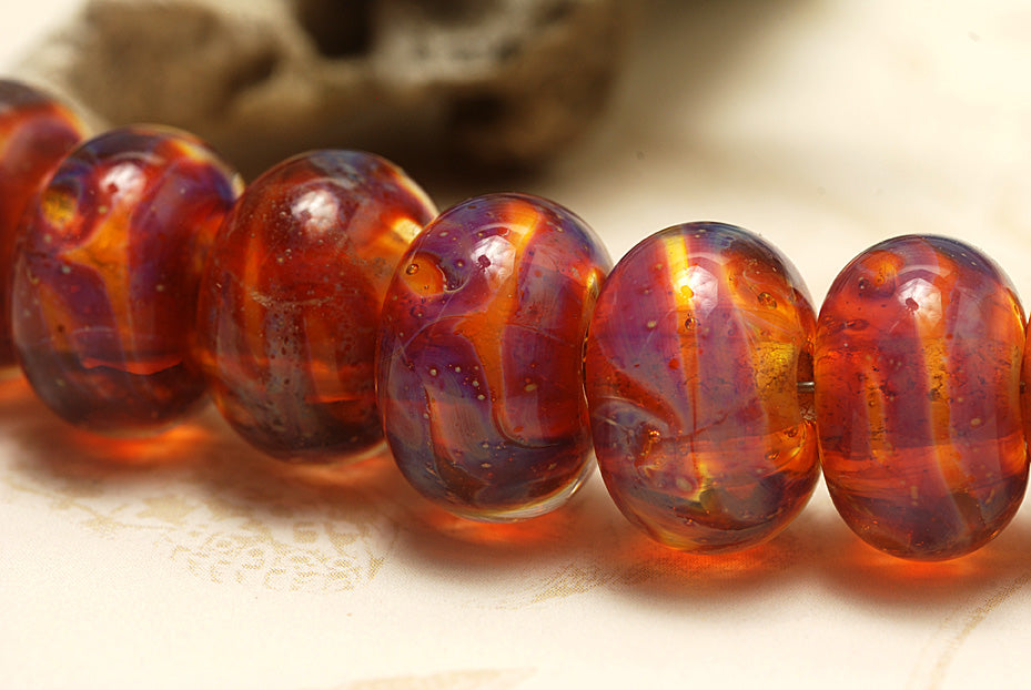 10602601 - Seven Orange & Purple Free Style Rondelle Beads