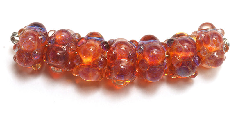 10602701 - Seven Orange & Purple Rondelle Beads