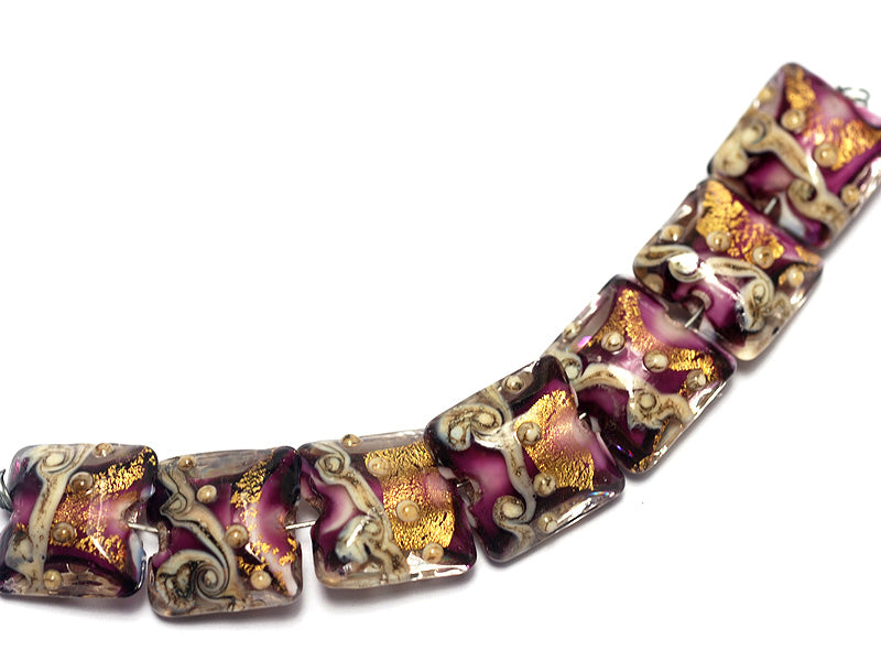 10602904 - Seven Amethyst Treasure Pillow Beads