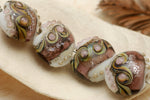 10603512 - Four Blushing Pink Stardust Lentil Beads