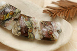 10603514 - Four Blushing Pink Stardust Pillow Beads