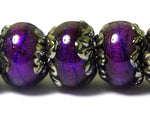 10604001 - Seven Violet Shimmer Rondelle Beads