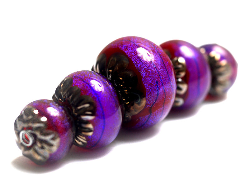 10604011 - Five Violet Shimmer Graduated Rondelle Beads