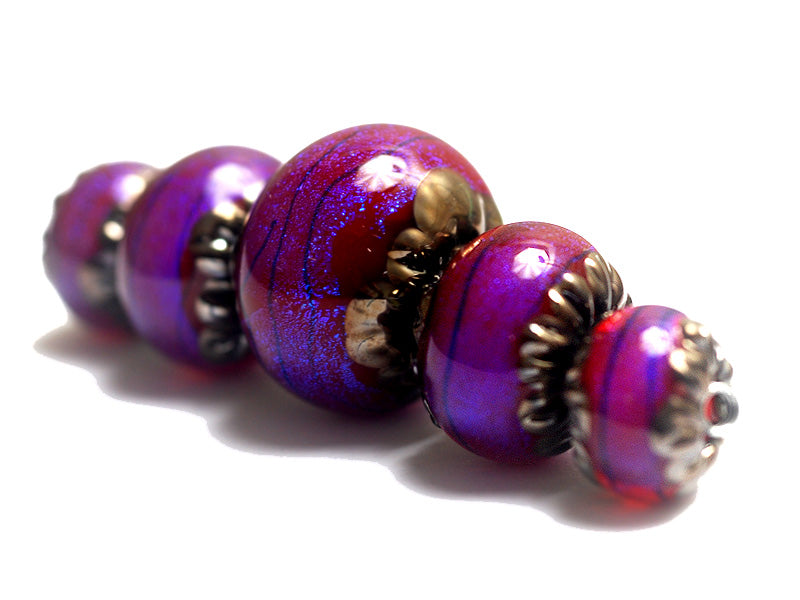 10604011 - Five Violet Shimmer Graduated Rondelle Beads