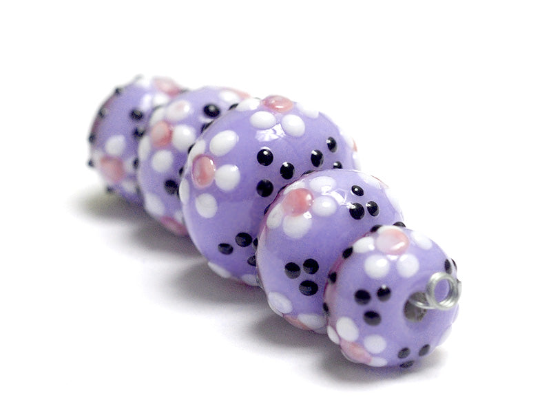 10605111 - Five Purple Blossom Graduated Rondelle Beads