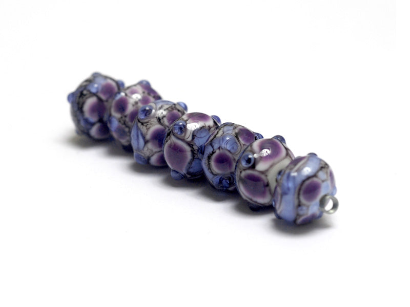 10605201 - Seven Lavender Rock River Rondelle Beads
