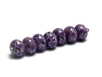 10605301 - Seven Purple Honey Rondelle Beads