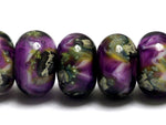 10605401 - Seven Purple Meadow Rondelle Beads