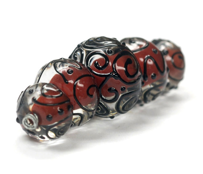 10702711 - Five Graduated Red Core w/Black Strips Rondelle Beads