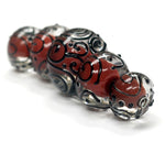 10702711 - Five Graduated Red Core w/Black Strips Rondelle Beads