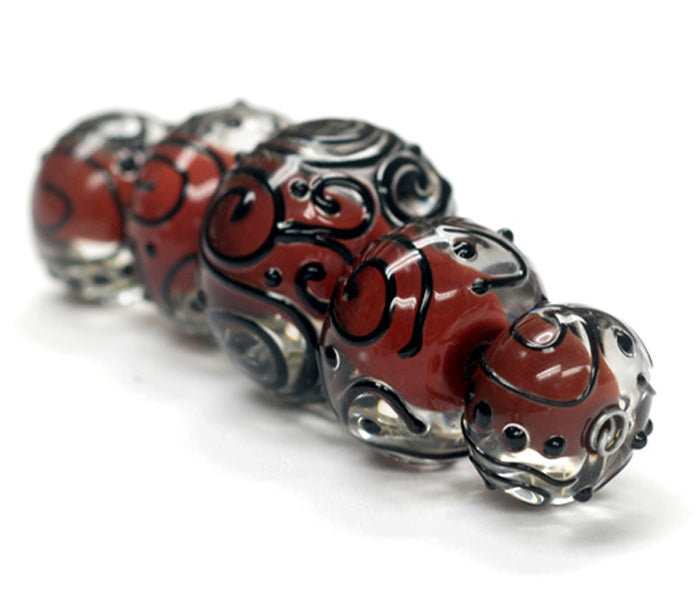 10702711 - Five Graduated Red Core w/Black Strips Rondelle Beads