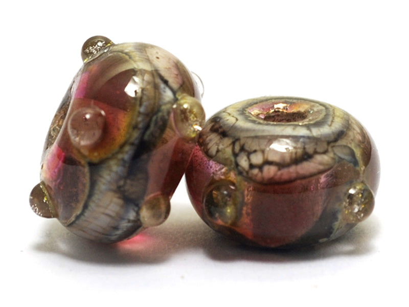 10703801 - Seven Transparent Red w/Silver Foil Rondelle Beads