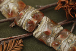 10703804 - Seven Transparent Red w/Silver Foil Pillow Beads