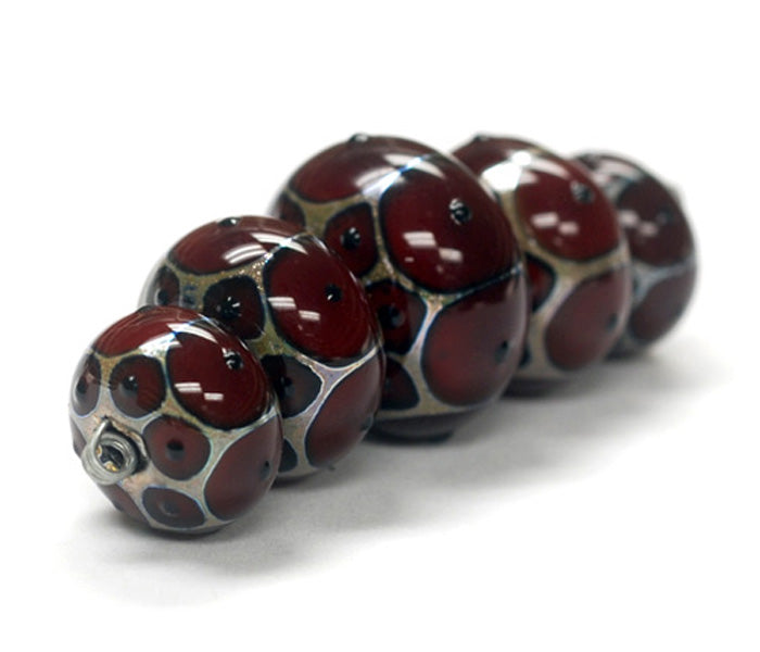 10703901 - Five Graduated Red w/Black Dots Rondelle Beads