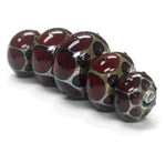 10703901 - Five Graduated Red w/Black Dots Rondelle Beads